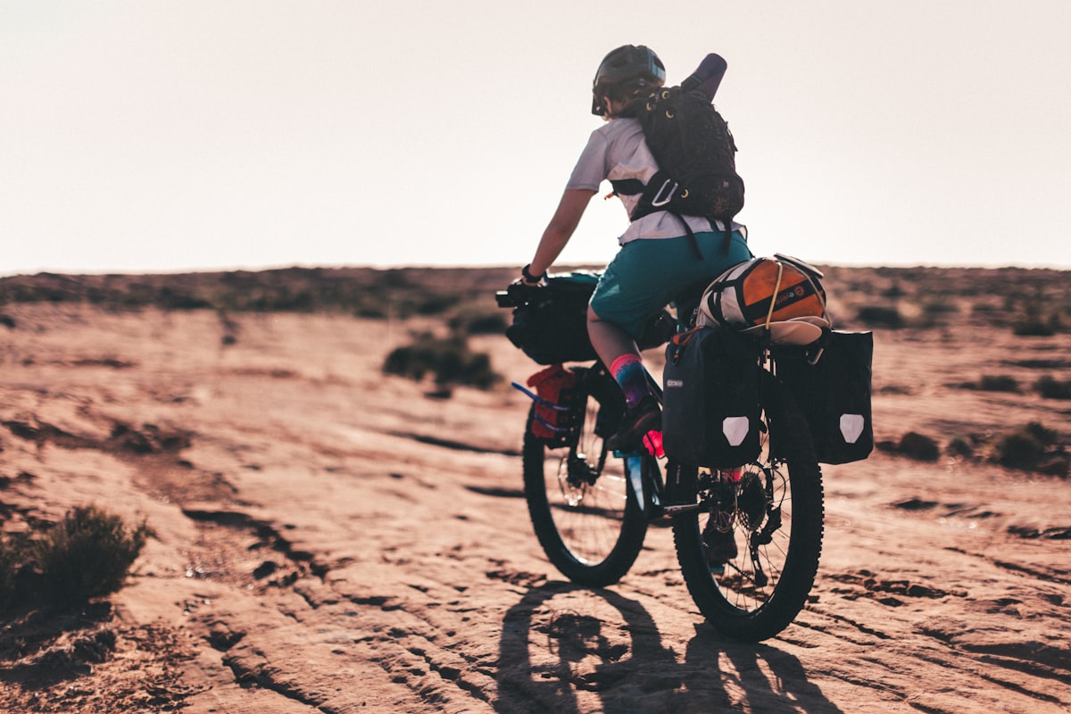 Cyclist on remote wilderness road